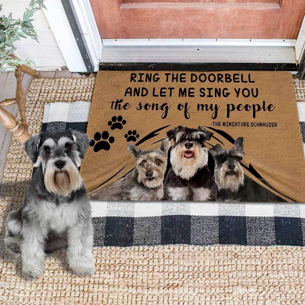 The miniature schnauzers ring the doorbell and let me sing you the song of my people doormat